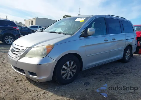 2010 Honda Odyssey Ex z USA, uszkodzony, nr VIN 5FNRL3H55AB109914